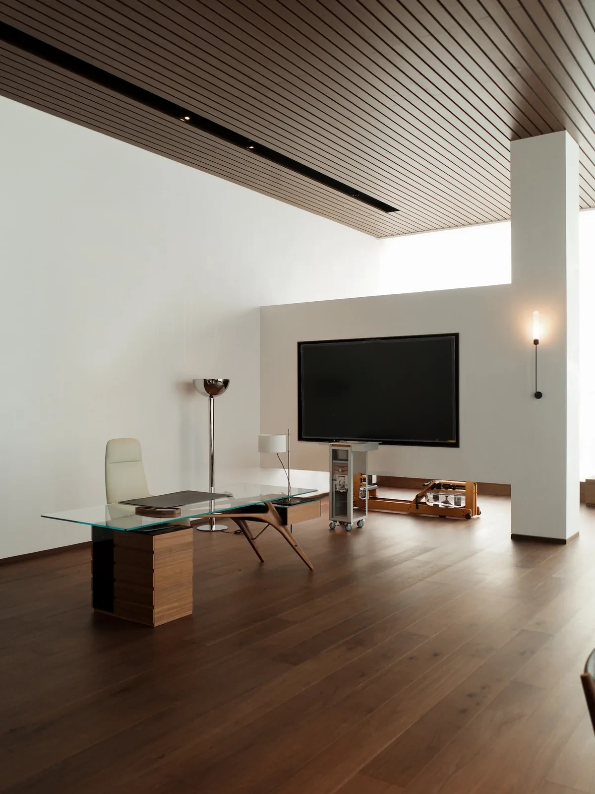Double-height library and executive workspace